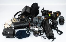 Cameras: a Minolta X-300 camera, another, together with a group of lenses of various makes including