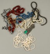 Jewellery: eight necklaces of various lengths and materials, to include Baltic amber and freshwater 