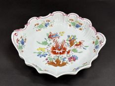 A Doccia dessert dish, c.1770, boldly painted in the Tulipano pattern, the scroll-moulded rim picked