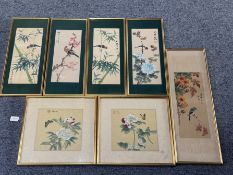 A set of four Japanese watercolours on silk of birds perched on plants, with a further similar paint