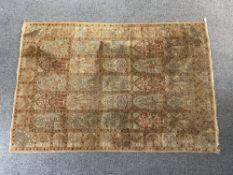 Rugs: an early 20th century hand knotted Persian Bakhtiari style rug, typical symbolism of trees, fl