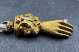 Jewellery: 19th-century yellow metal bracelet clasp in the form of a hand, set with a single diamond