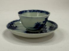 An 18th century Chinese blue and white tea bowl and saucer, Nanking Cargo but certificate misplaced,