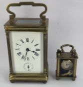 Clocks: a 20th century brass cased carriage alarm clock, unsigned, 14.5cm, together with a miniature