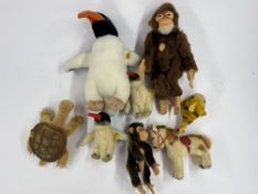 A collection of Steiff soft toys, mid 20th century, including a large penguin and two smaller models