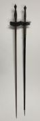 Two dress or mourning rapiers, late 19th century, with trefoil blades, the cross guard and grips wit