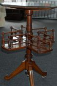 A mahogany revolving library table, late 19th/early 20th century, with ebony inlay and bobbin turnin