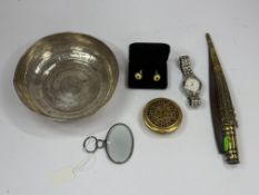 Objects Of Vertu: a 19th century white metal framed magnifying glass; a pierced brass cased travel c