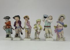 Four KPM (Berlin) month or 'Zodiac' figures, modern, after F E Meyer, modelled as children represent