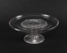 A glass tazza or stand, early 19th century, moulded to the underside and raised on a moulded pedesta