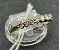 Jewellery: 9ct yellow gold half hoop ring, set with seven brilliant-cut diamonds, estimated weight o