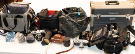 Photography: a Panasonic WS1 video camera with accessories, cased; a Canon FTb; a Zorki 4 camera; a 