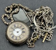 Watches: a white metal cased half hunter pocket watch bearing Swiss hallmarks, together with three u