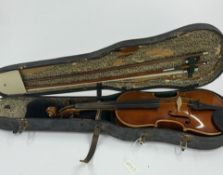 A child-sized antique violin, early 20th century, contained in a faux leather case with two bows, to