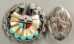 Jewellery: a lapis lazuli set silver circular brooch with matching earrings, together with a silver 