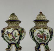 Ceramics: a pair of Chelsea-style pot-pourri vases and covers, 19th century, of pierced lobed form, 
