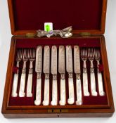 Silver &amp; Plate: a cased set of fruit cutlery, each with pistol grip carved mother of pearl handl