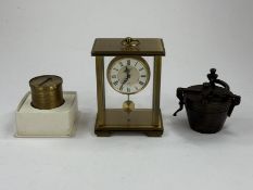 A set of reproduction Nuremberg brass weights, contained in a fitted bucket-shaped case, a Uhren Nie