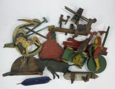 A collection of wooden folk art toys and automata, 19th/20th century, including an articulated model