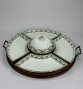 An English hors d'oeuvres set, late 19th century, with four Staffordshire porcelain dishes decorated