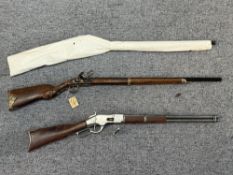 Militaria: a replica early 18th century French rifle, another, and a replica Winchester 1866 model r