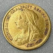 Coins: an 1899 Queen Victoria veiled head gold half sovereign, circulated.