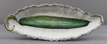Ceramics: a majolica cucumber dish of elongated leaf form, the fruit naturalistically moulded and de