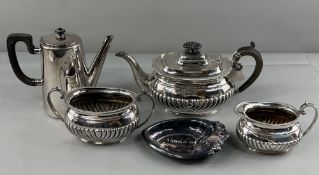 Silver Plate: a three piece tea set by Maple and Co., with lower gadrooning and beaded rim; a heart 