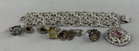 Costume Jewellery: a white metal and marcasite openwork bracelet of continuous symmetrical scrollwor