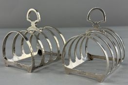 Silver: a pair of four slot toast racks by Mappin & Webb, Sheffield 1937, each with stirrup shap