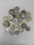 Coins: Silver foreign coins, various grades 90%, 40%, 64 %, 25%, 72%, 133 grams.