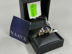 Jewellery: a statement yellow metal ring, marked 14k and testing as gold, set three graduated sapphi