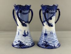 A pair of large Royal Crown Derby vases, date codes for 1901, the waisted forms painted by or in the