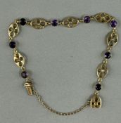 Jewellery: Yellow metal fancy oval link bracelet set with eight amethysts, estimated weight of (8) 3