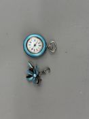 Watches: a ladies pin set silver and pale blue guilloche enamel pendant watch, on associated bow bro
