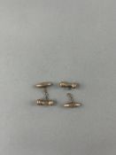 Jewellery: Pair of 9ct gold chain cufflinks (damaged), hallmarked Chester, weight 3.3 grams.