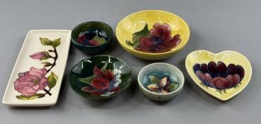 Ceramics: a yellow ground Moorcroft Hibiscus pattern bowl, bearing Queen Mary label to the underside