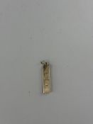 Jewellery: a 9ct yellow gold ingot pendant, hallmarked London 1976, 5cm long, 32.9g.