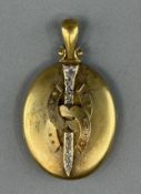 Jewellery: Equestrian related- a yellow metal oval hinged locket, 44.5mm x 36.8mm, back engraved wit