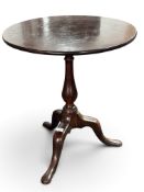 Furniture: Cuban mahogany tilt-top tripod table, small proportions with a one-piece top, 62cm diamet