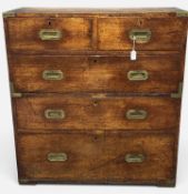 Furniture: 19th century mahogany campaign chest of drawers, in two sections, flush brass handles and
