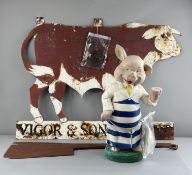Social History: Butchery- a painted metal sign in the form of a bull, above the text 'Vigor & So