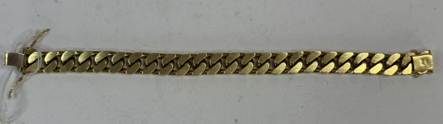Jewellery: a heavy yellow metal curb link bracelet, bearing Italian 18ct gold hallmarks and testing 