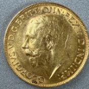 Coins: a 1913 George V full gold sovereign, circulated.
