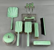 Silver: an Art Deco mint green enamelled 12 piece dressing table set, harlequin dates but mainly lat