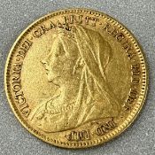 Coins: a 1901 Queen Victoria veiled head gold half sovereign, circulated.