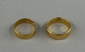 Jewellery: a 22ct yellow gold wedding band, Chester 1909, 5.2mm width, 3.2g, together with a second 