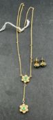 Jewellery: Yellow metal necklet, foxtail link, length 42cm, with a floral cluster pendant attached, 