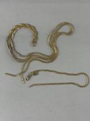 Jewellery: 9ct gold triple entwined zip style links with swivel fastener, length 17 inches, hallmark