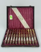 Silver: an early 20th century cased set of 12 mother of pearl handled fruit knives by Lazarus Posen,